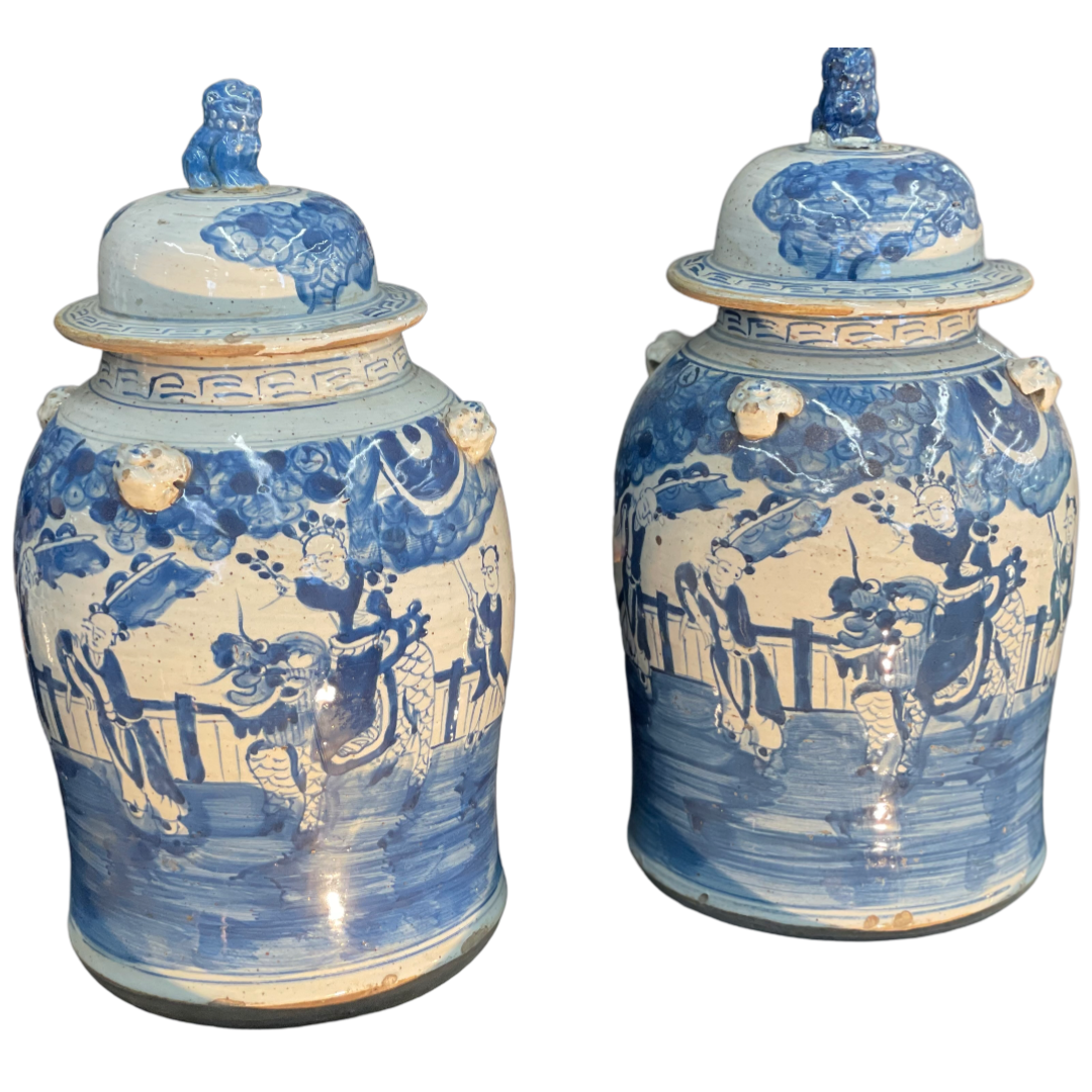 Pair of Chinese Blue & White People Temple Jars w/ Foo Dog Finials