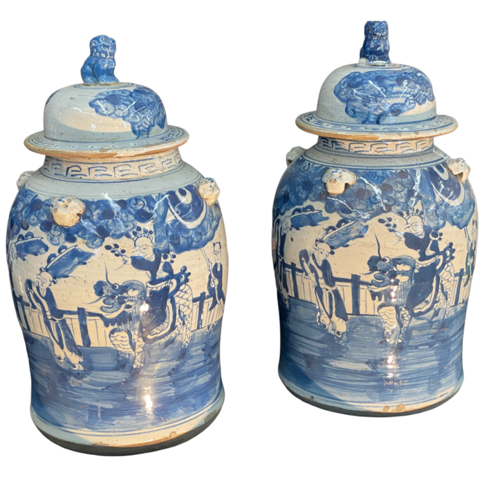 Pair of Chinese Blue & White People Temple Jars w/ Foo Dog Finials